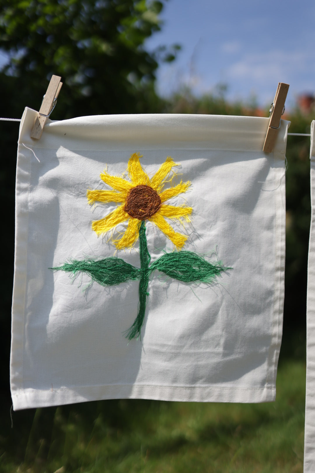 Motivflag “Solsikke”